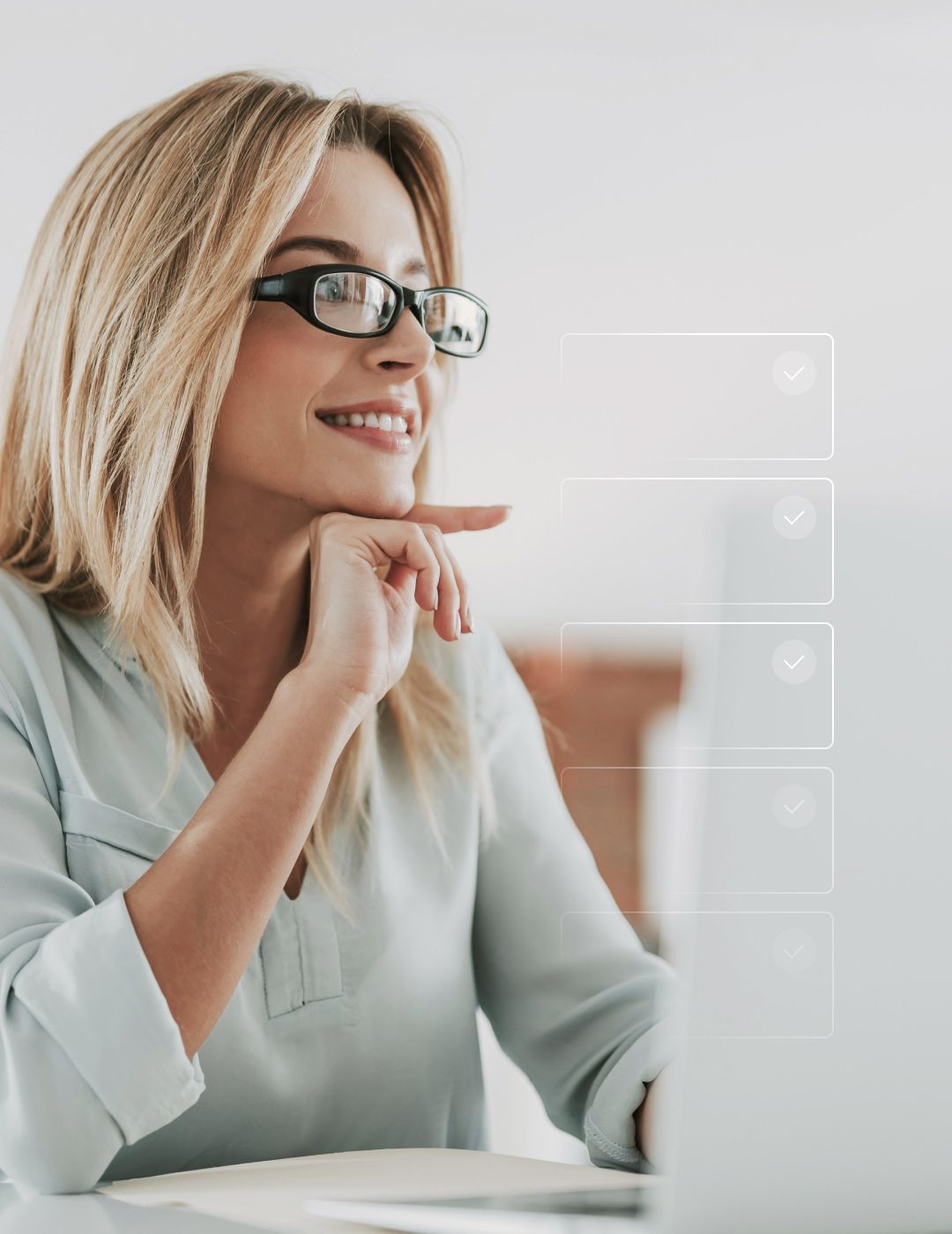 a happy person working at a laptop